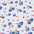 Tela de impresión textil de punto mini flor de punto personalizada